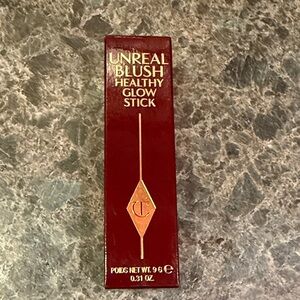 Charlotte Tilbury Unreal Blush Glow Stick in Berry Glow